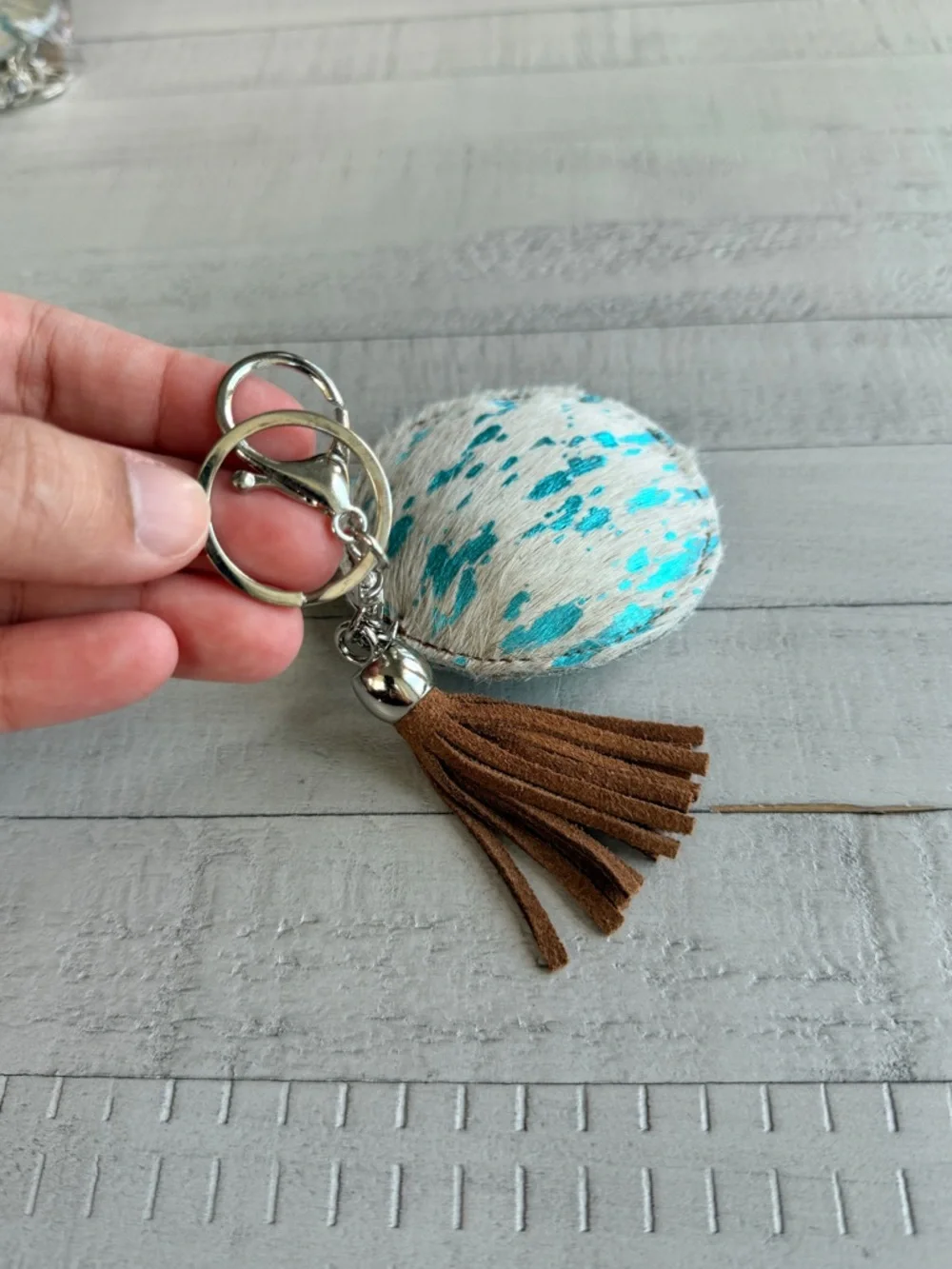 Western Acid Wash Round Turquoise & White Haircalf Keychain with Brown Tassel